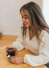 Woman holding hemp oil CBD tincture 500mg - view 3